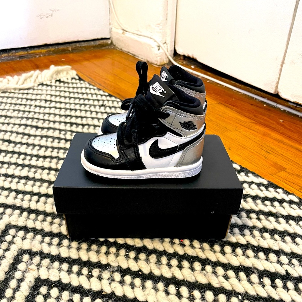 Air Jordan Retro high black and silver. Infants size 4.